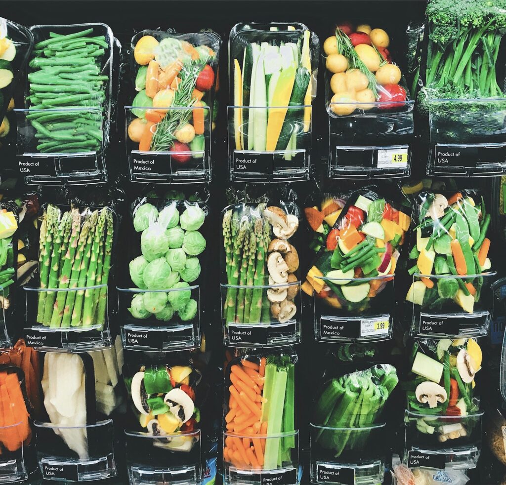 A wall of beautiful, healthy assortment of vegetables at the grocery store